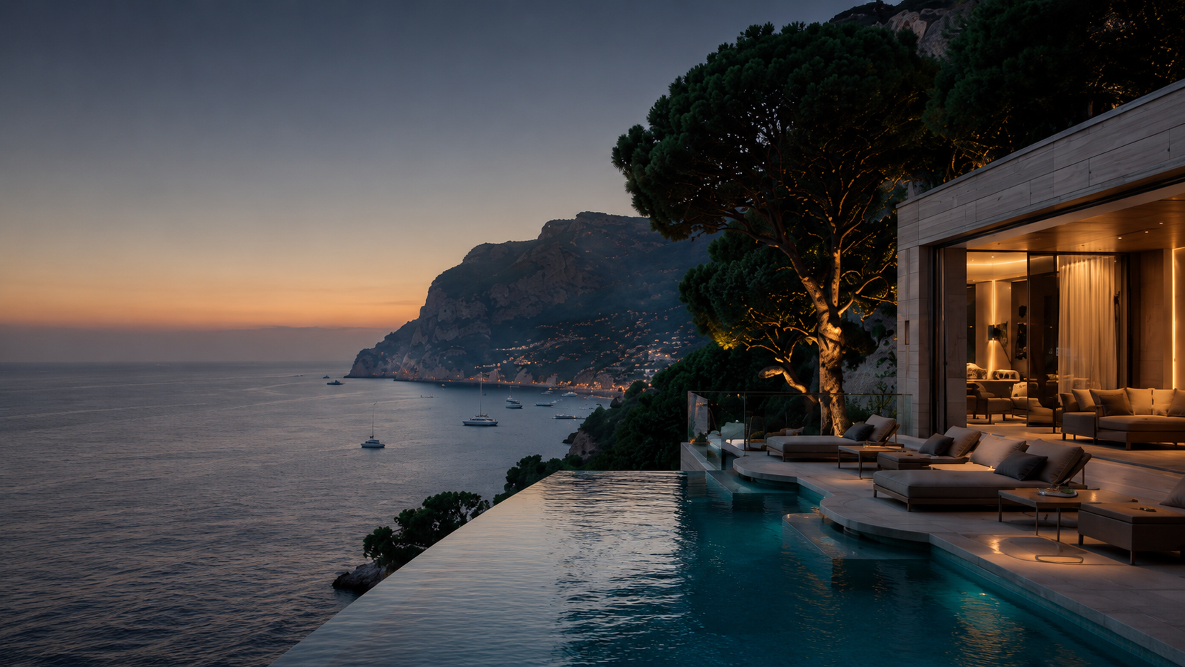 Luxury villa terrace overlooking the coast at dusk